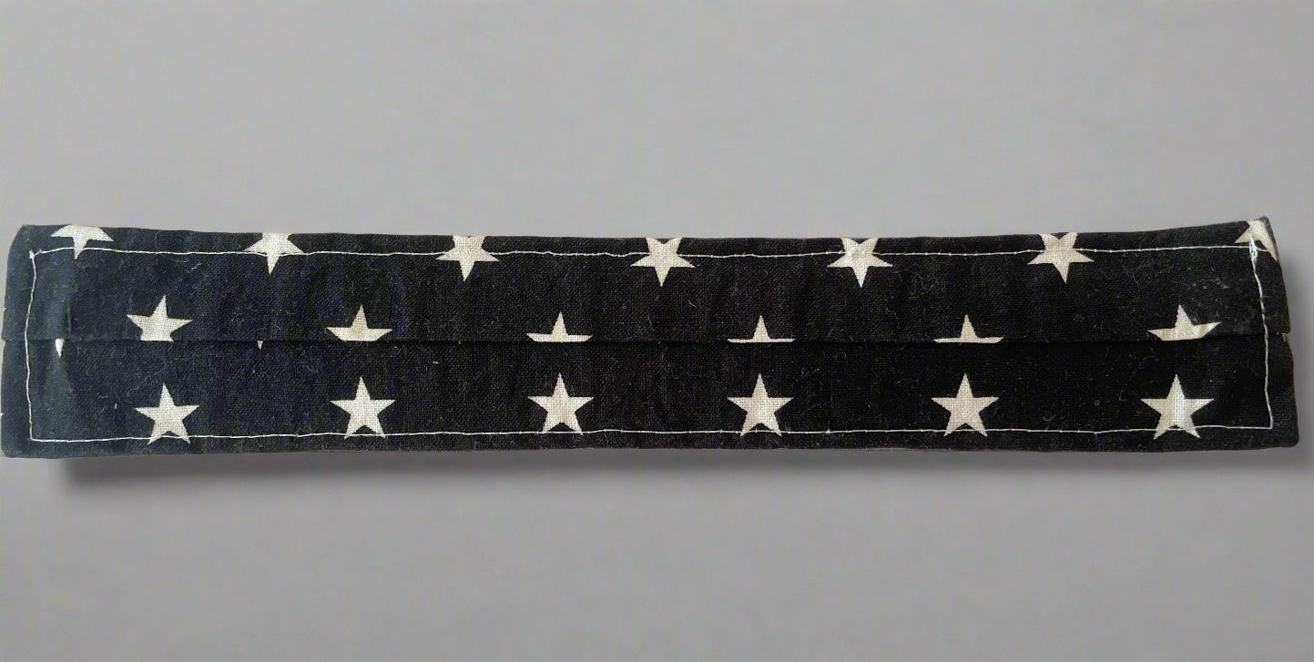 back side of a fabric covered slap bracelet for children